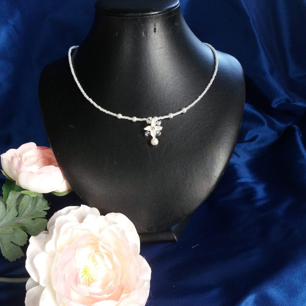 kralen ketting met bloem