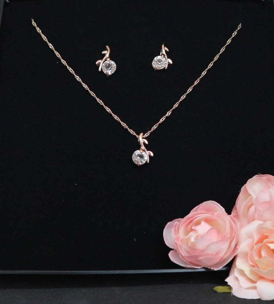 Kettingset rose goud bloem