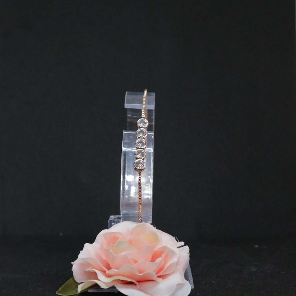 rosé gouden armband met 5 strass steentjes